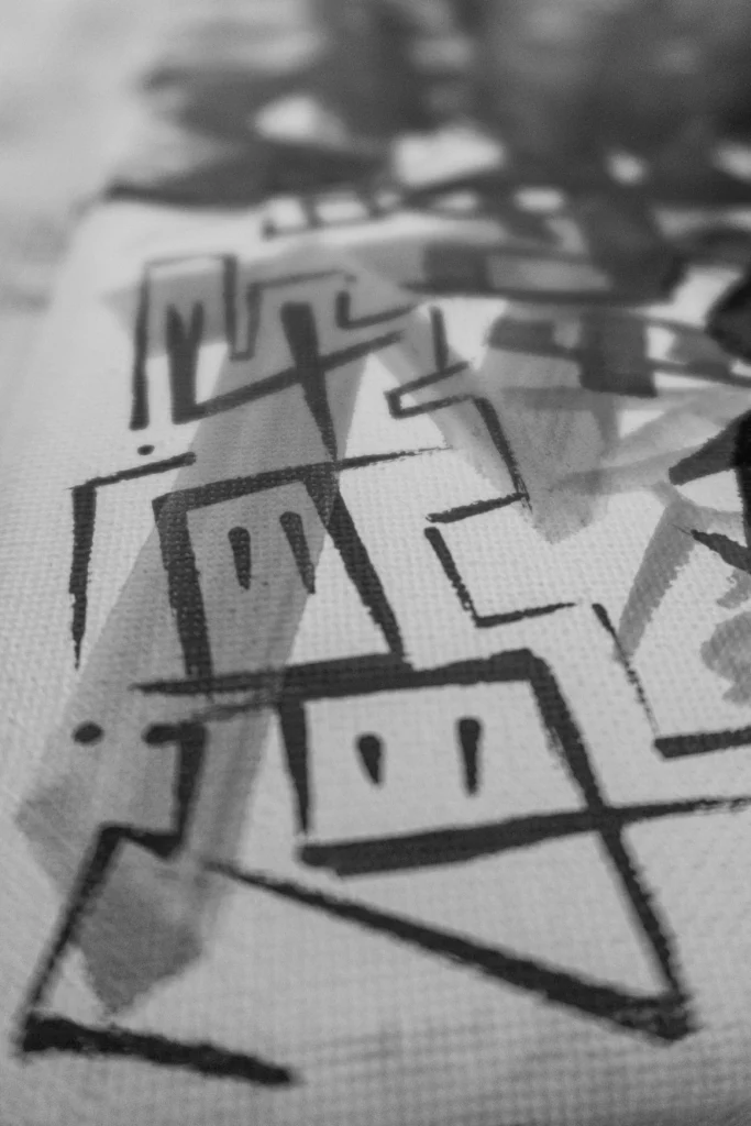Handgemaltes 409 Graffiti-Tag auf Leinwand als Symbol für die Werte und Identität von 409 Arts